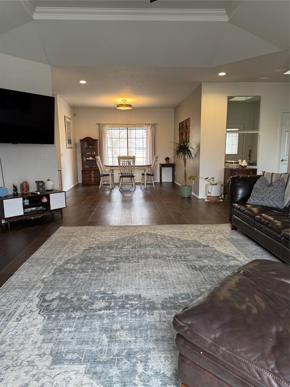 living room featuring recessed lighting and wood finished floors