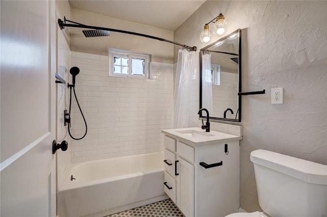 324 NW 24th St, Oklahoma City, OK 73103 - full bathroom featuring toilet, shower / bath combination with curtain, vanity, and a textured wall