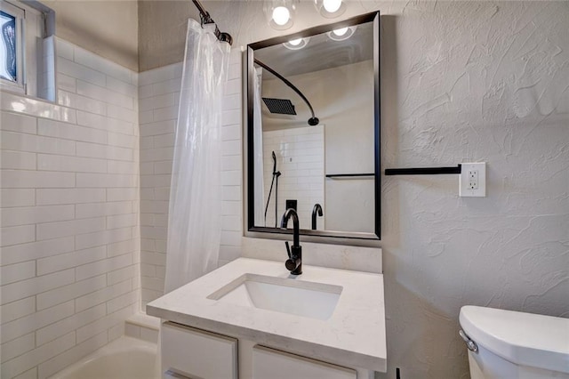 324 NW 24th St, Oklahoma City, OK 73103 - full bathroom featuring shower / bathtub combination with curtain, visible vents, toilet, vanity, and a textured wall