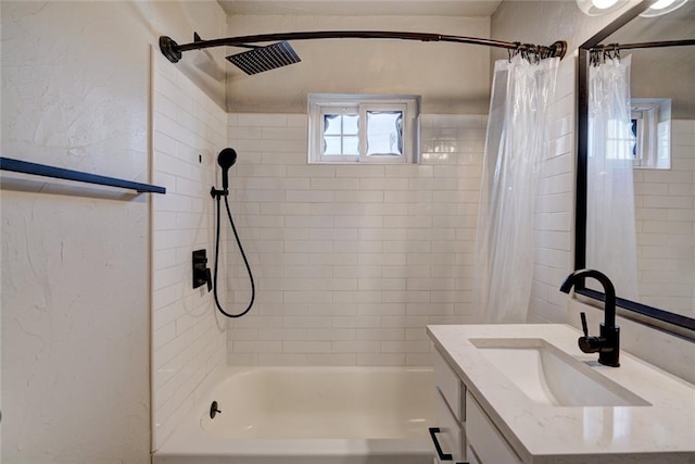 324 NW 24th St, Oklahoma City, OK 73103 - full bathroom with vanity, shower / tub combo, and a textured wall
