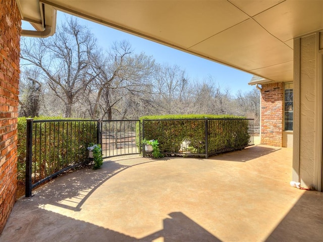 view of patio / terrace featuring a gate