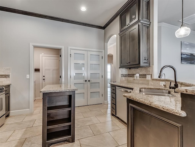 kitchen featuring arched walkways, ornamental molding, a sink, stainless steel dishwasher, and backsplash