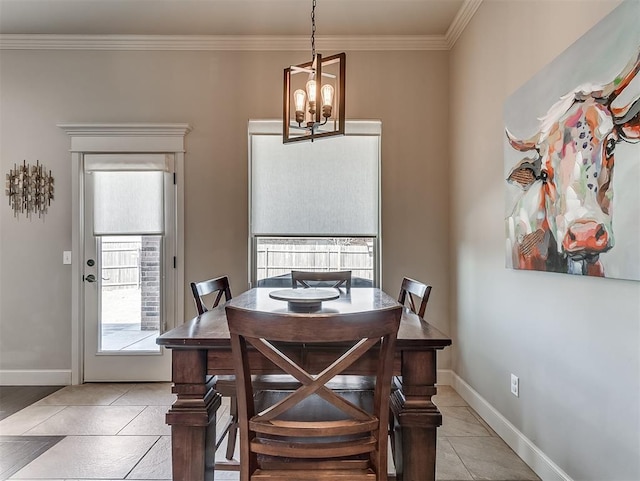 dining room with light tile patterned floors, baseboards, and crown molding