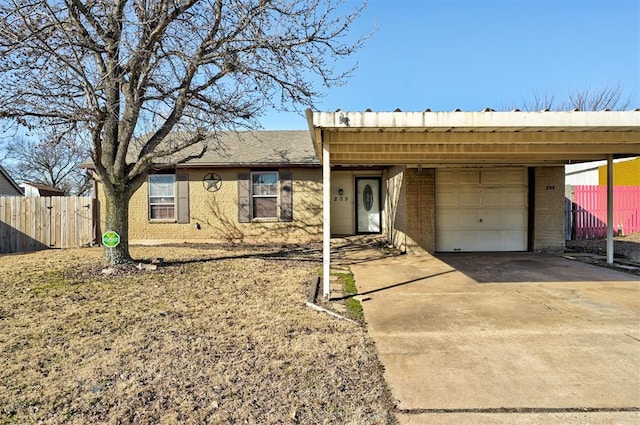 ranch-style house with brick siding, concrete driveway, fence, and a garage