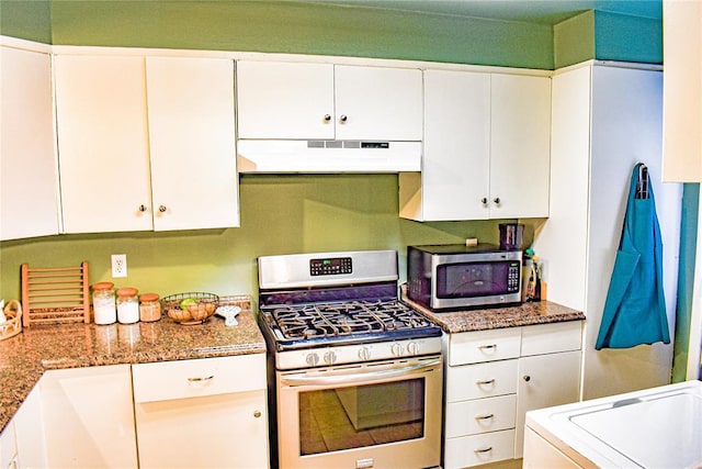 kitchen featuring white cabinetry, light stone counters, under cabinet range hood, and stainless steel appliances