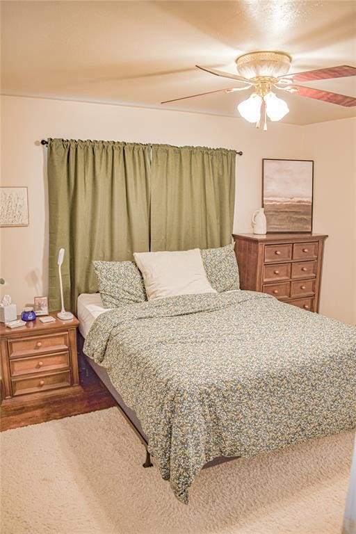 bedroom featuring carpet flooring and ceiling fan