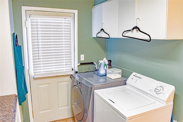 washroom with laundry area and washer and clothes dryer