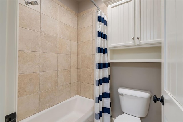 full bath featuring toilet and shower / tub combo with curtain