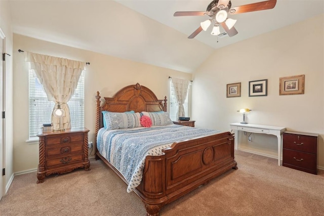 bedroom with vaulted ceiling, a ceiling fan, baseboards, and light carpet