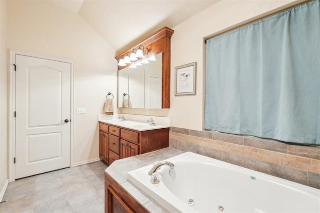 full bath with tile patterned flooring, lofted ceiling, double vanity, a tub with jets, and a sink