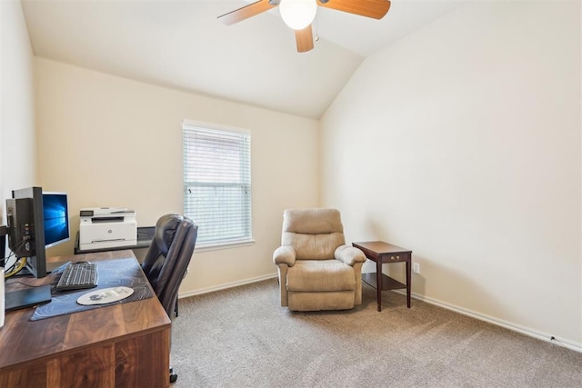 home office with baseboards, carpet, ceiling fan, and vaulted ceiling