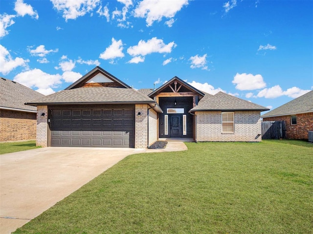 ranch-style home featuring a front lawn, an attached garage, brick siding, and driveway