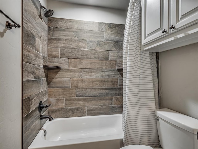 bathroom featuring shower / bath combo with shower curtain and toilet