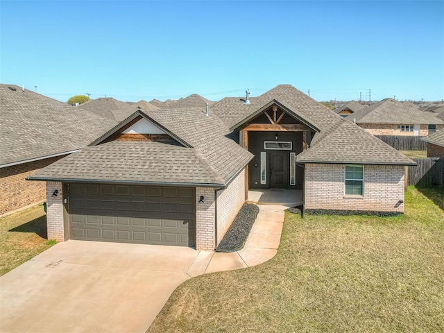 view of front facade featuring concrete driveway, a shingled roof, a front lawn, and fence