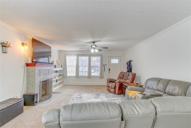 living room featuring baseboards, a fireplace, a textured ceiling, crown molding, and light colored carpet