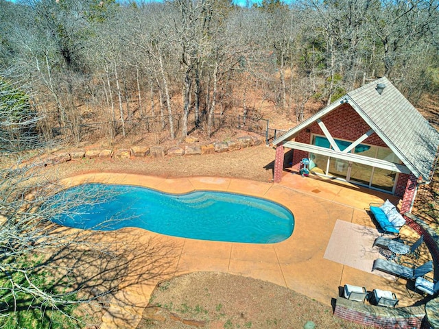 outdoor pool with a patio