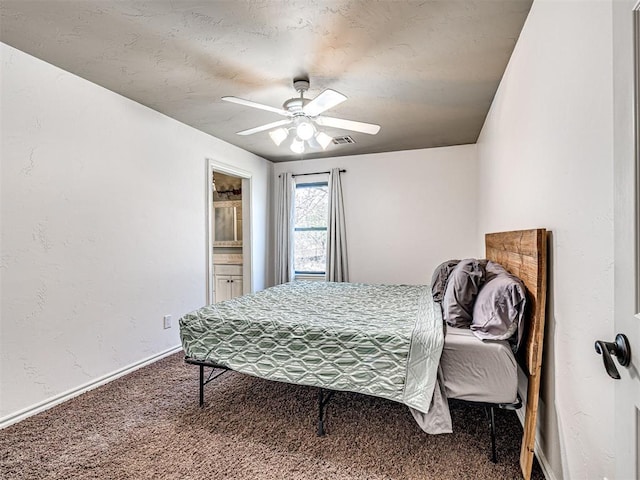 bedroom featuring a ceiling fan, baseboards, visible vents, carpet floors, and a textured wall