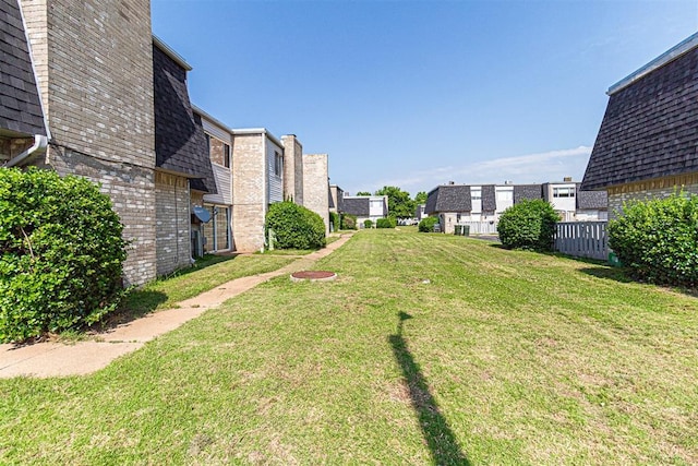 view of yard with fence