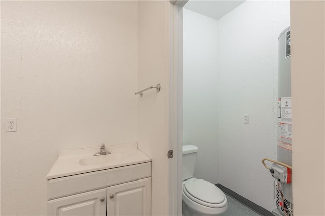 bathroom featuring gas water heater, toilet, vanity, and baseboards