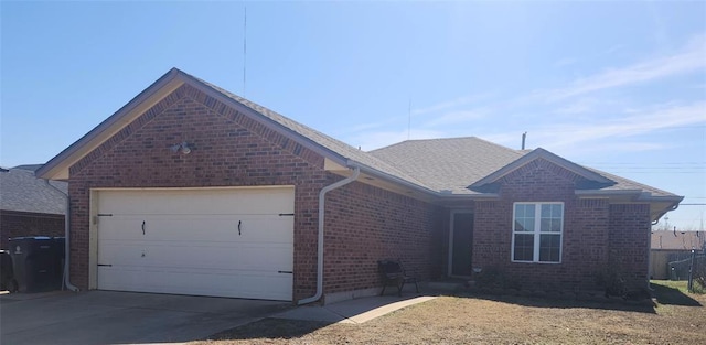 single story home featuring a garage, brick siding, driveway, and roof with shingles