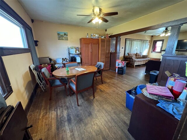 dining area featuring a ceiling fan and wood finished floors