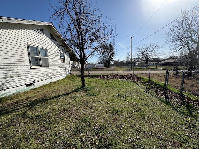 view of yard with fence