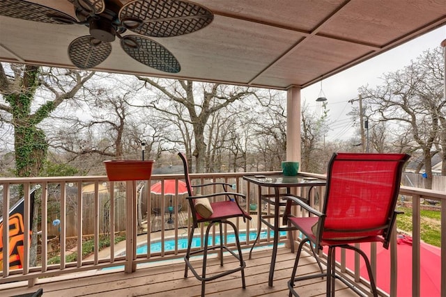 wooden terrace with ceiling fan