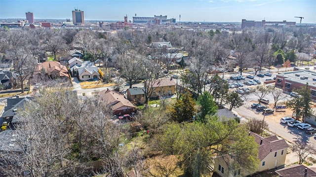 birds eye view of property with a city view