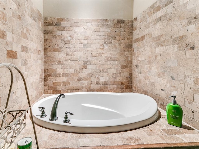 bathroom featuring a garden tub