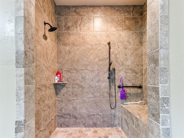 bathroom featuring tiled shower