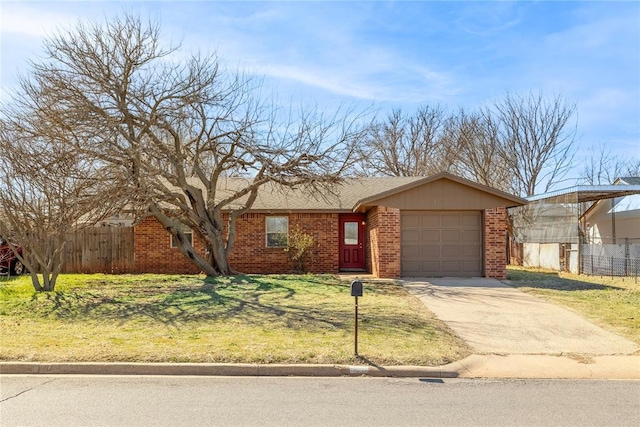 ranch-style house with a garage, brick siding, driveway, and fence