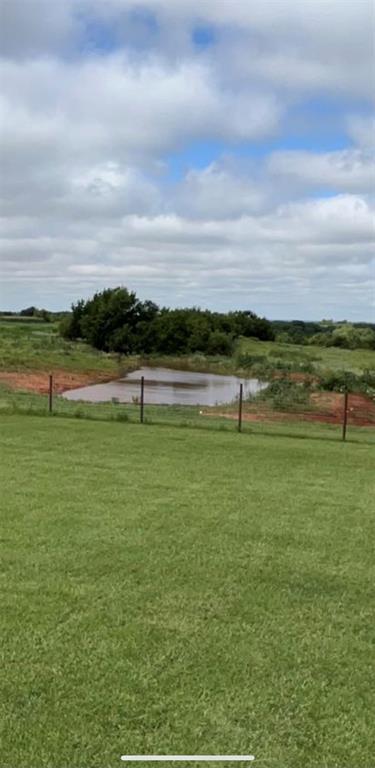 view of yard with a water view