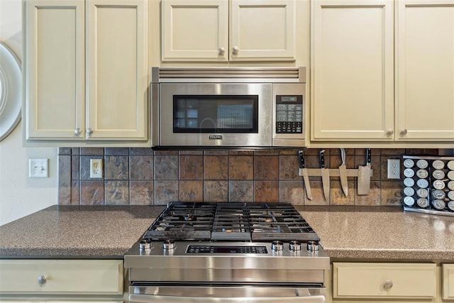 kitchen featuring decorative backsplash and stainless steel appliances