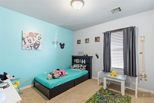 bedroom with visible vents, carpet flooring, and baseboards