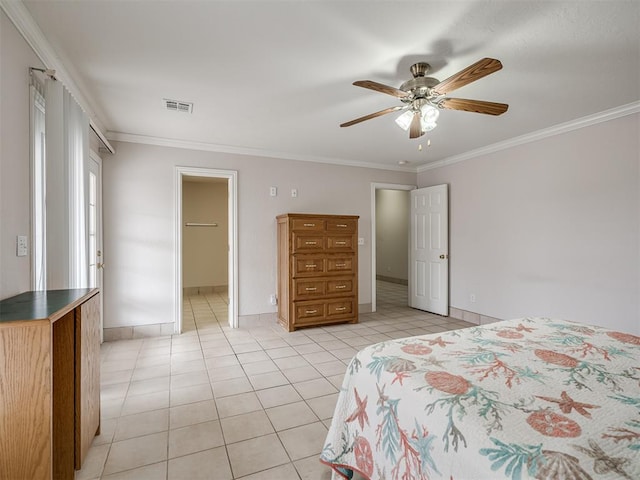 bedroom featuring light tile patterned floors, a ceiling fan, baseboards, visible vents, and ornamental molding