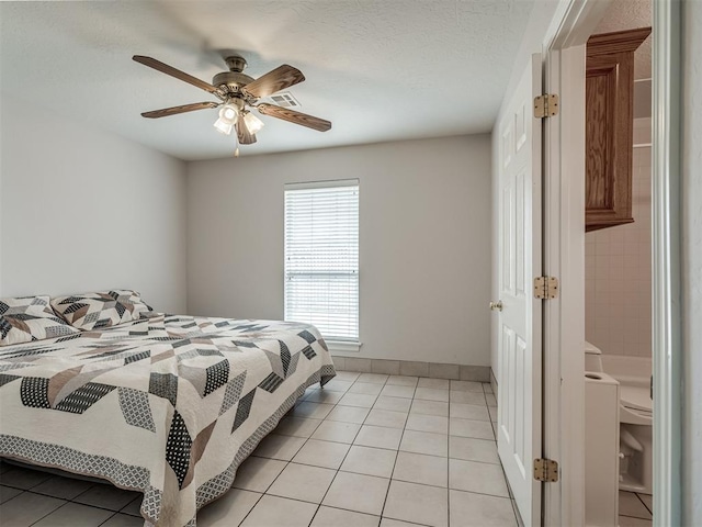 bedroom with light tile patterned floors, baseboards, and a ceiling fan