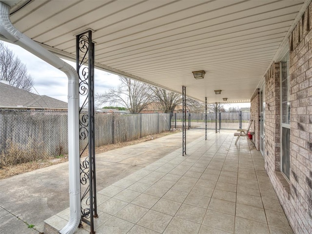 view of patio with a gate and a fenced backyard