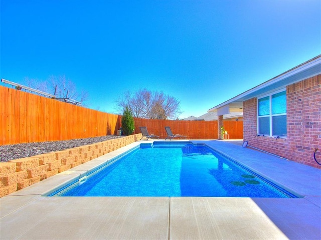 view of pool with a patio, a fenced backyard, and a fenced in pool