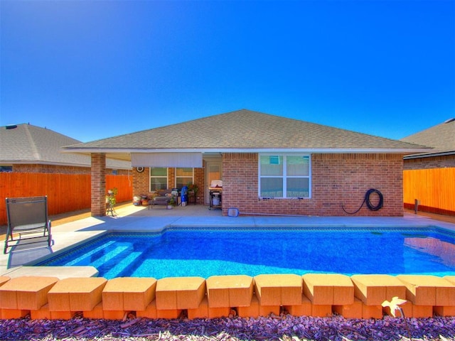 view of pool featuring a fenced in pool, a patio, and fence