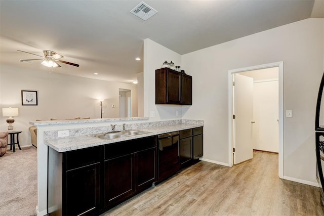 kitchen with visible vents, a sink, baseboards, dishwasher, and ceiling fan