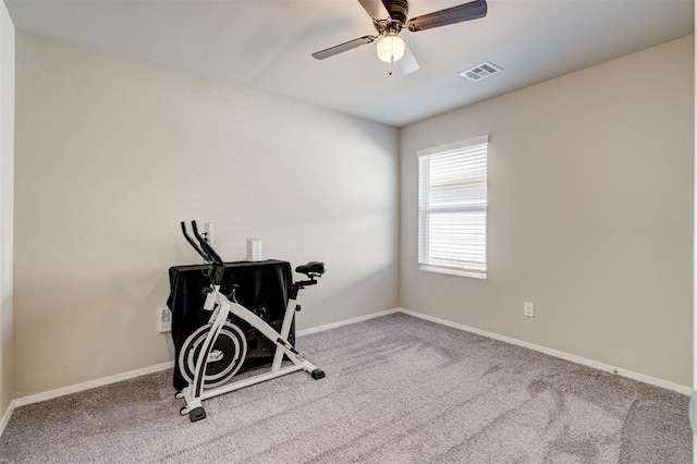 workout room featuring visible vents, baseboards, a ceiling fan, and carpet floors