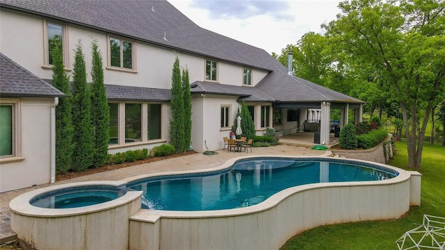2747 Walking Woods Trl, Edmond, OK 73049 - view of swimming pool featuring a patio and a pool with connected hot tub