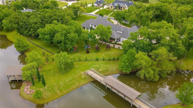 2747 Walking Woods Trl, Edmond, OK 73049 - drone / aerial view of a nearby body of water and a tree filled landscape