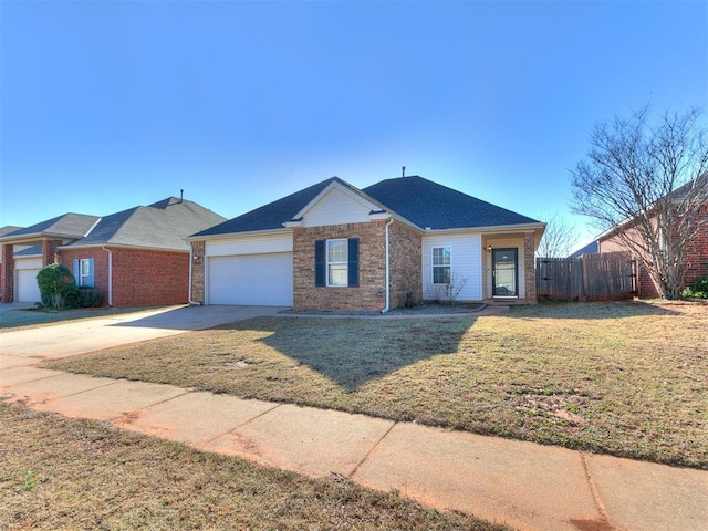 ranch-style house with driveway, a front lawn, fence, an attached garage, and brick siding