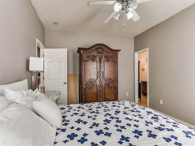 bedroom with connected bathroom and ceiling fan