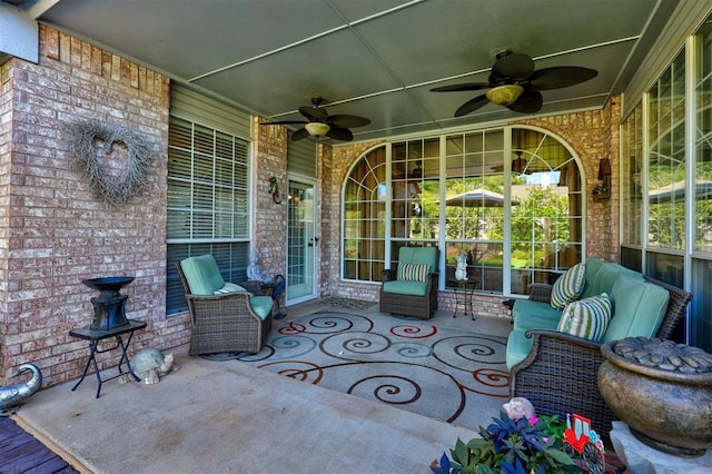 view of patio featuring a ceiling fan