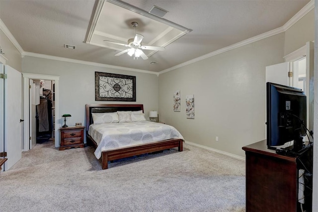 bedroom with visible vents, crown molding, and carpet