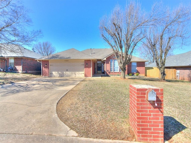 ranch-style house with brick siding, an attached garage, a front lawn, fence, and driveway