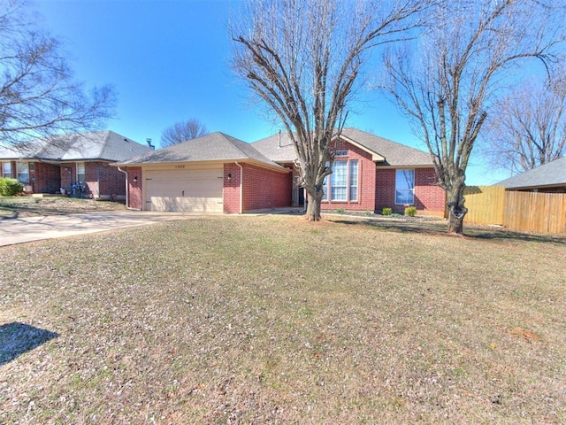 ranch-style home featuring fence, driveway, an attached garage, a front lawn, and brick siding