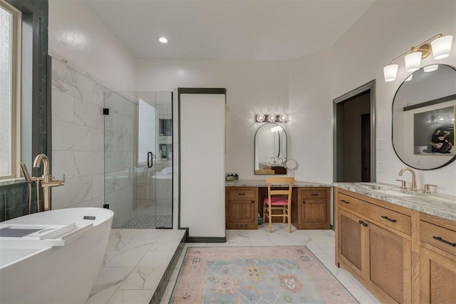 bathroom with recessed lighting, a stall shower, a freestanding tub, marble finish floor, and vanity